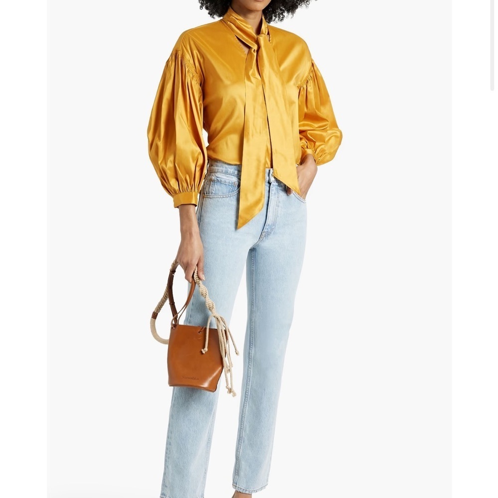 ULLA JOHNSON
Daphne high-rise slim-leg jeans